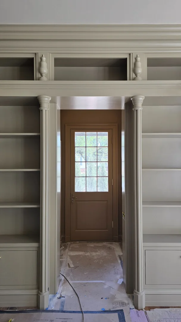 Cased Opening, Baseboard, and Cornice work integrated closely with Cabinetry Team